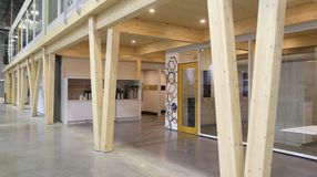DIRTT Timber Frame uses glued-laminated timber and cross-laminated timber to create custom, pre-fabricated mezzanines.  